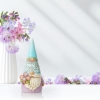 Gnome figurine with flowers