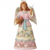 Angel figurine with Easter basket and butterflies