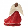 Story figurine - Jim Shore - Angel with red cloak and poinsettia flowers