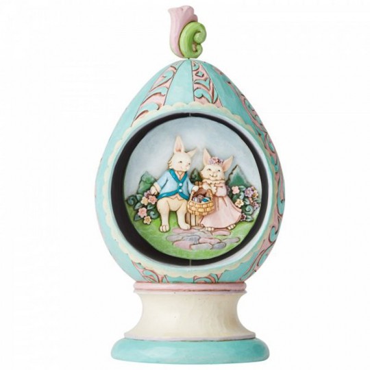 Rotating Egg figurine with bunnies and chicks